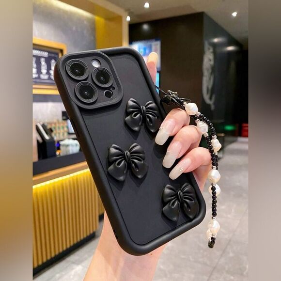 Sleek Black Bow iPhone 16 Pro Max Case with Pearl Strap - Picture 3 of 6